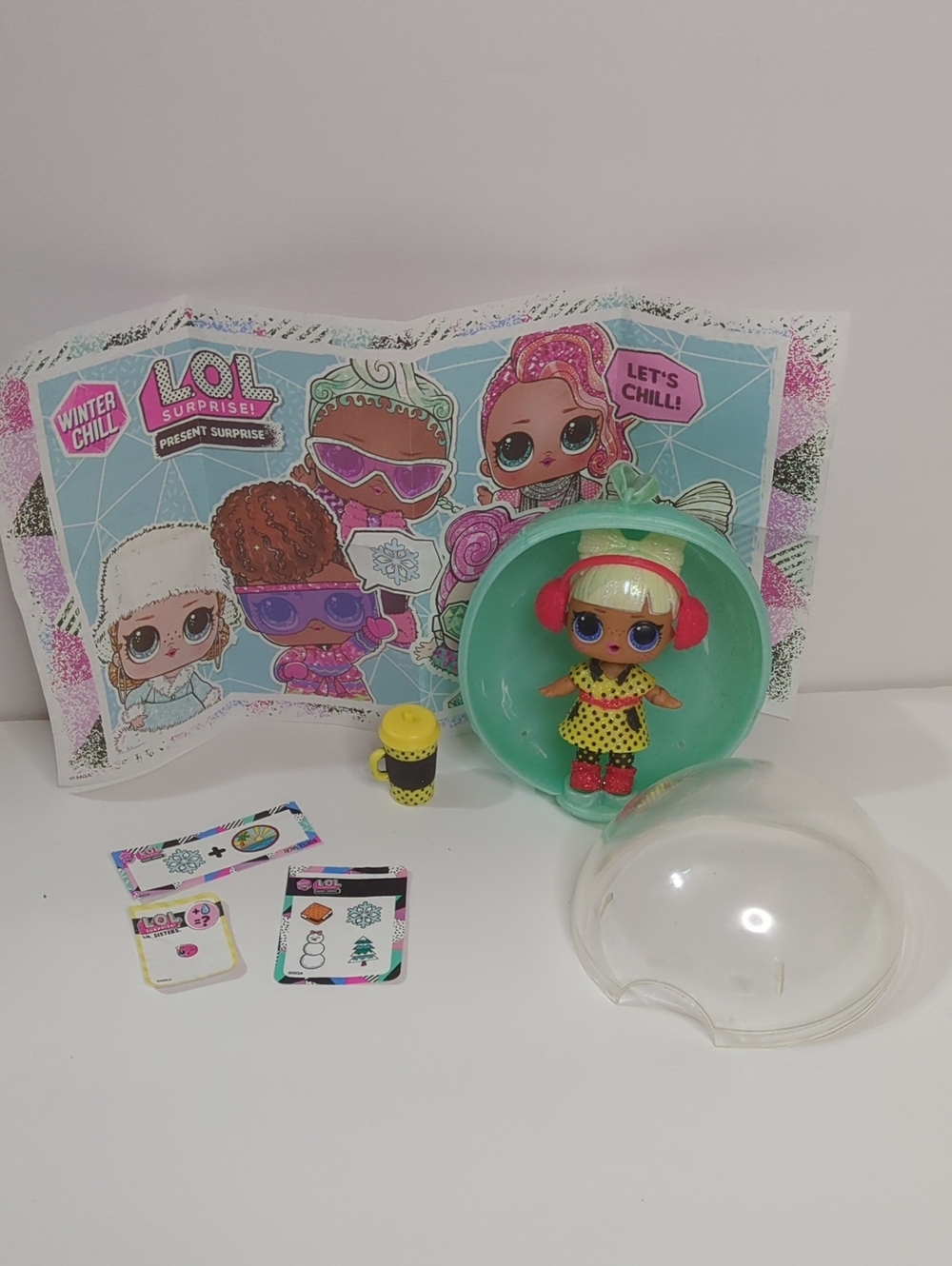L.O.L. Surprise! Mint Green Capsule Playset with Yellow & Red Accented Doll